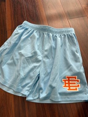 Eric Emanuel Light Blue Athletic Shorts with Orange Logo